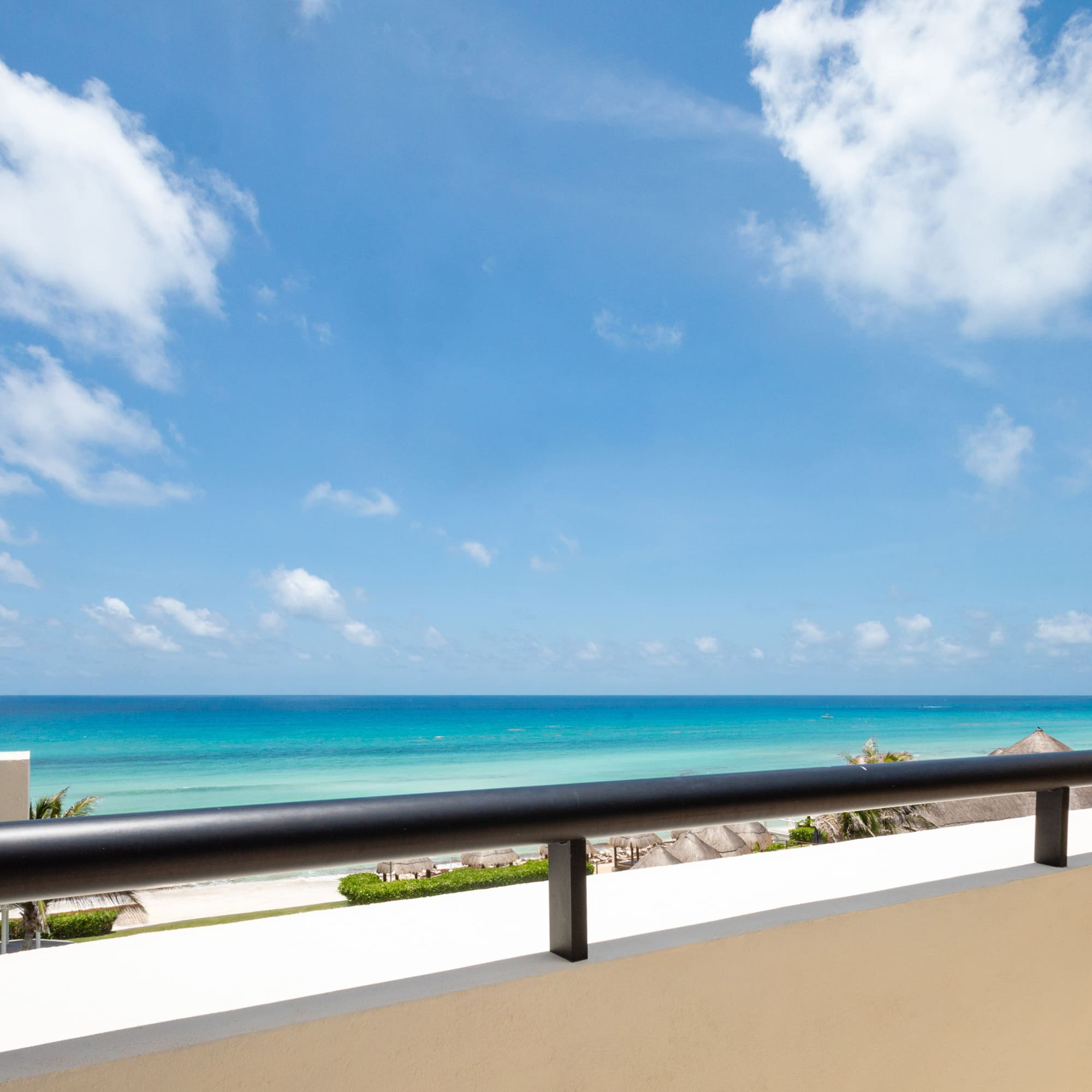 a balcony overlooking the ocean