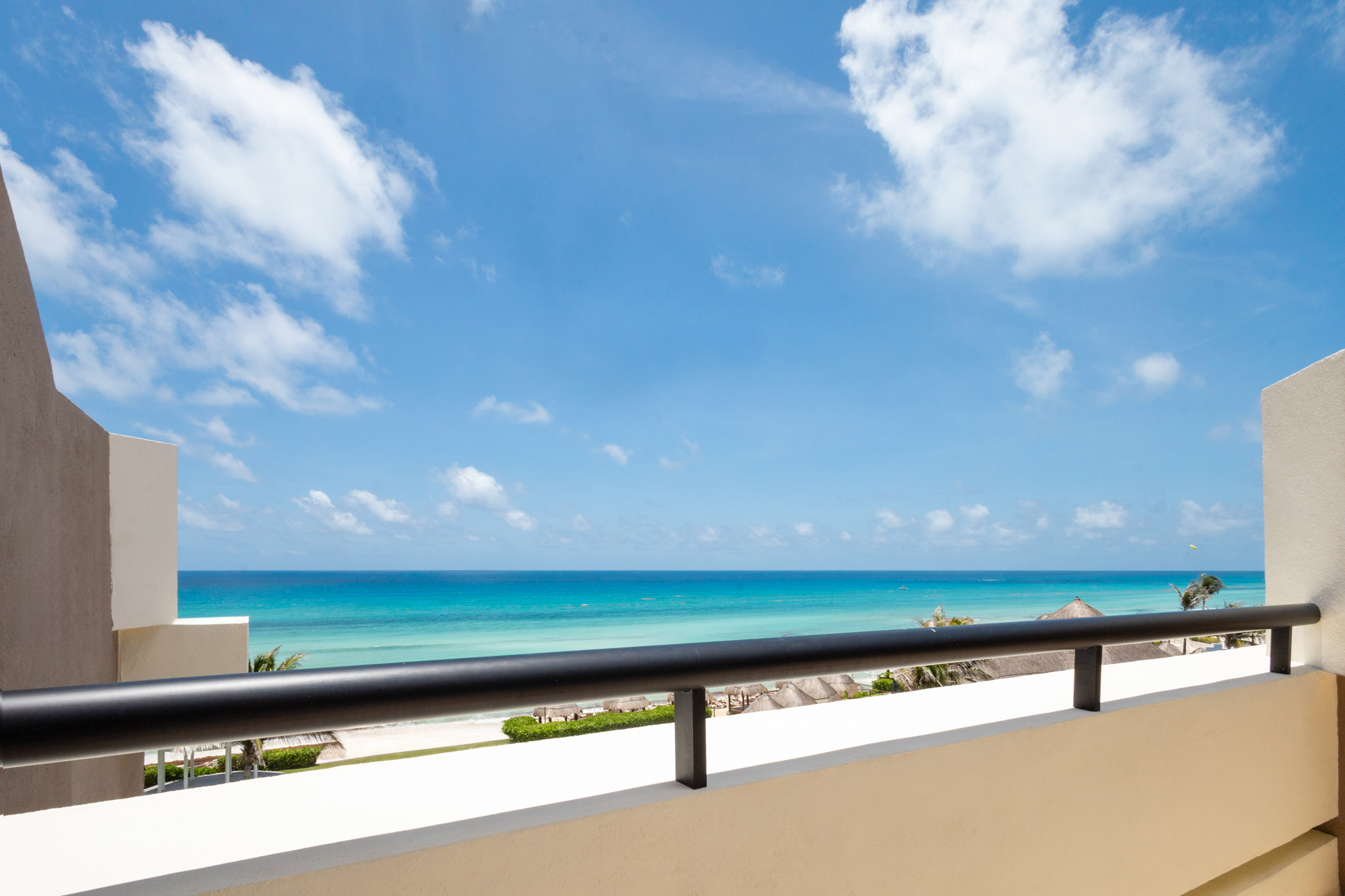 a balcony overlooking the ocean