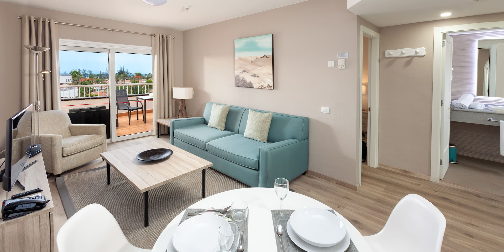 a living room with a couch and a table