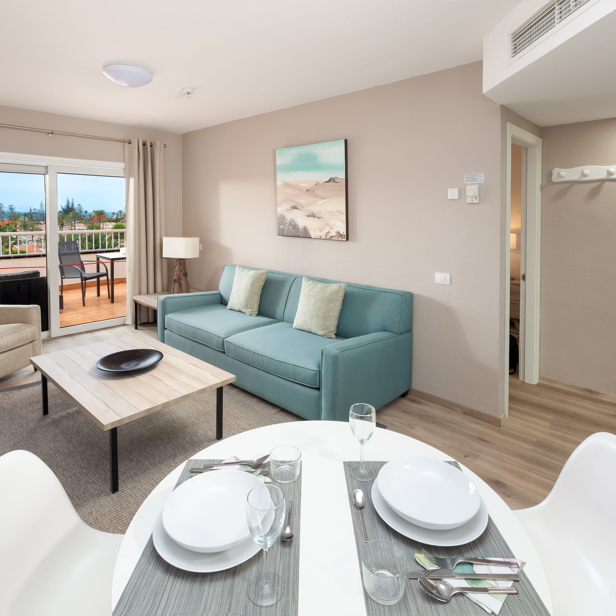 a living room with a couch and a table