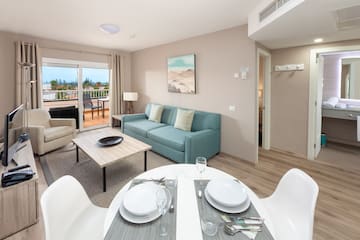 a living room with a couch and a table