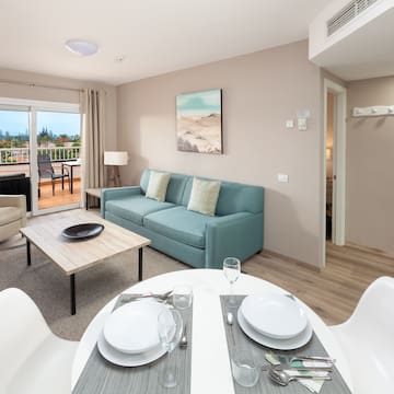 a living room with a couch and a table