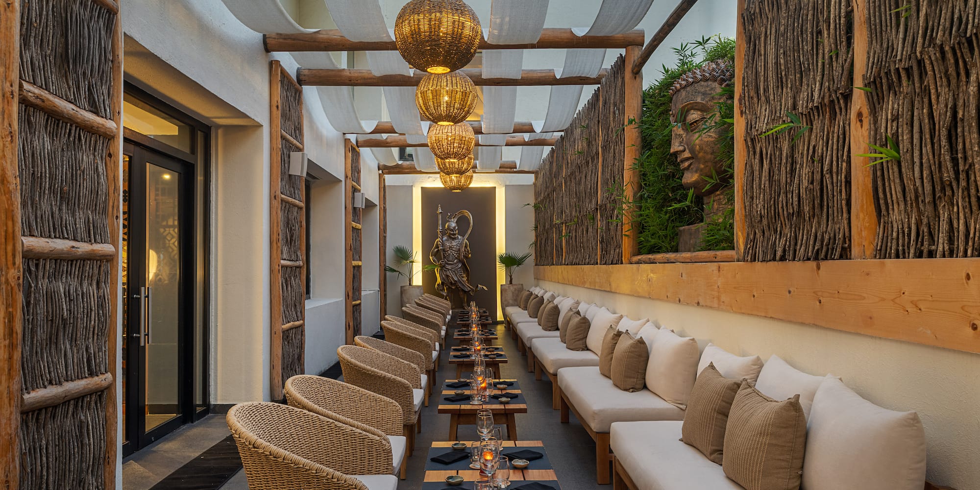 a long room with tables and chairs