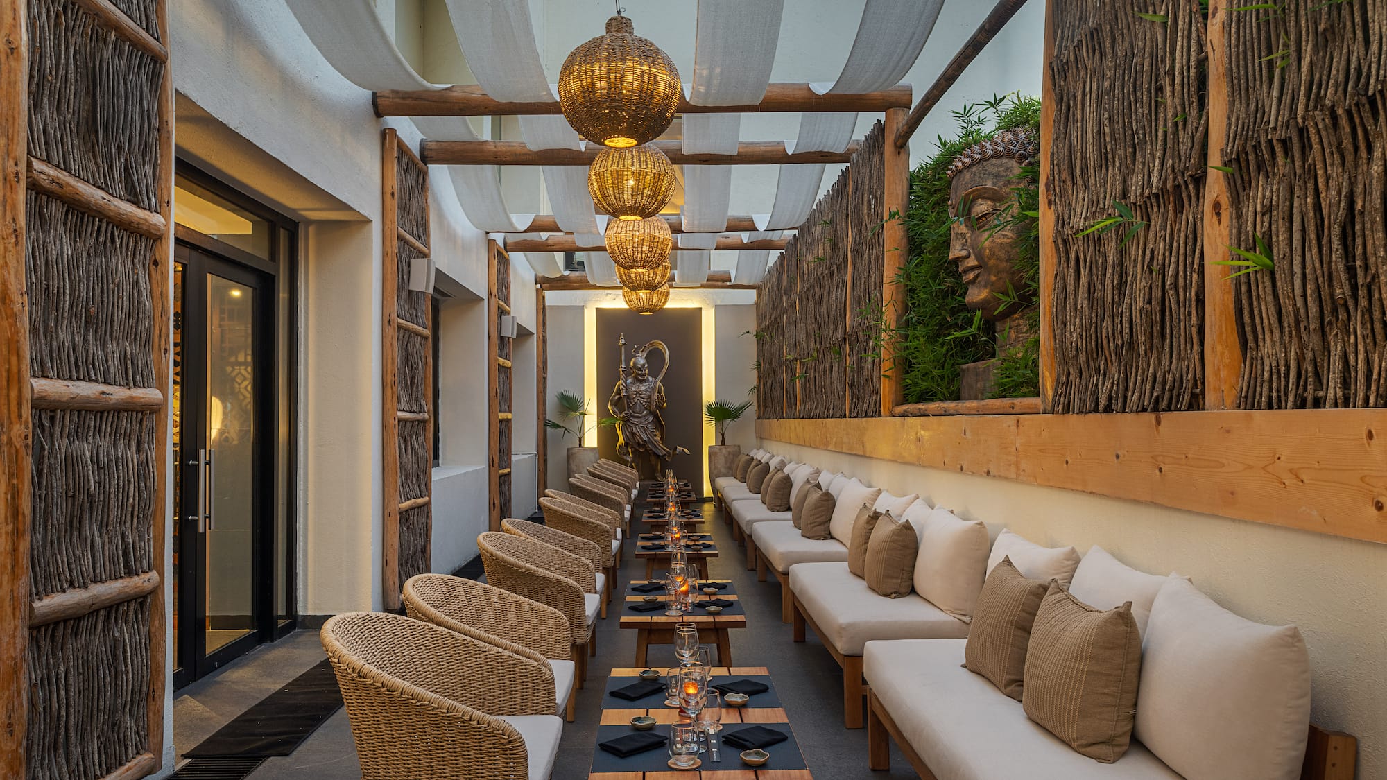 a long room with tables and chairs