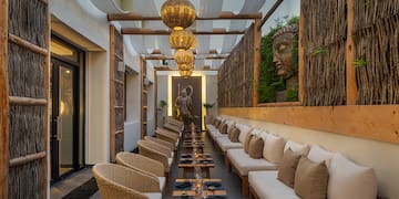 a long room with tables and chairs