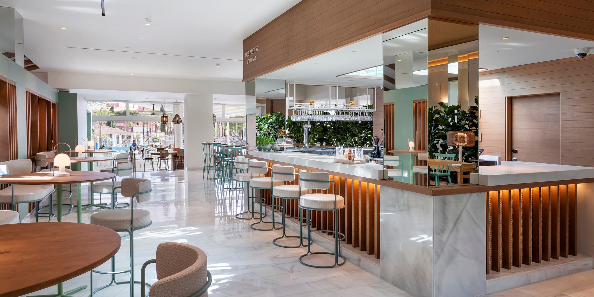 a restaurant with tables and chairs