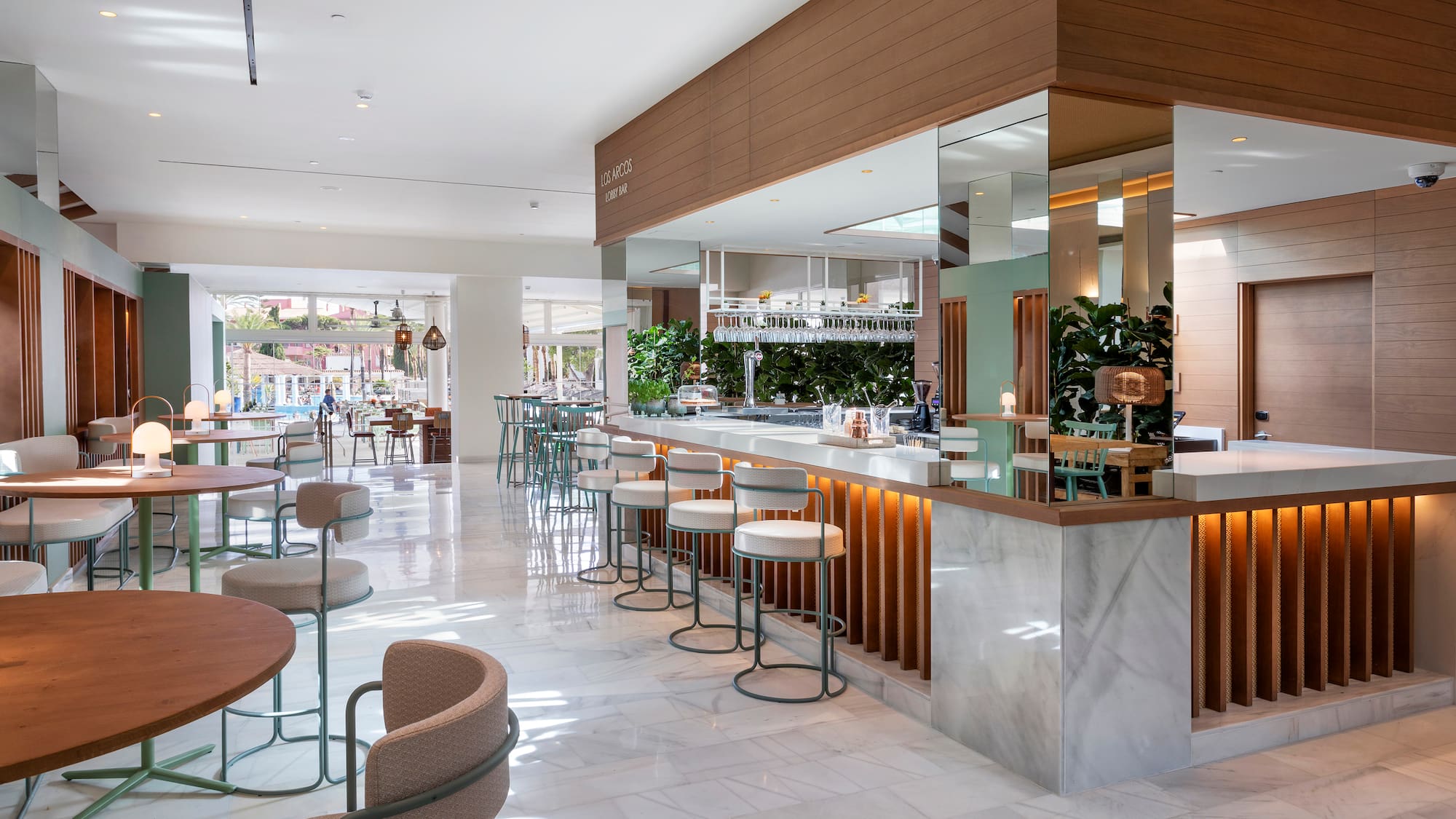 a restaurant with tables and chairs