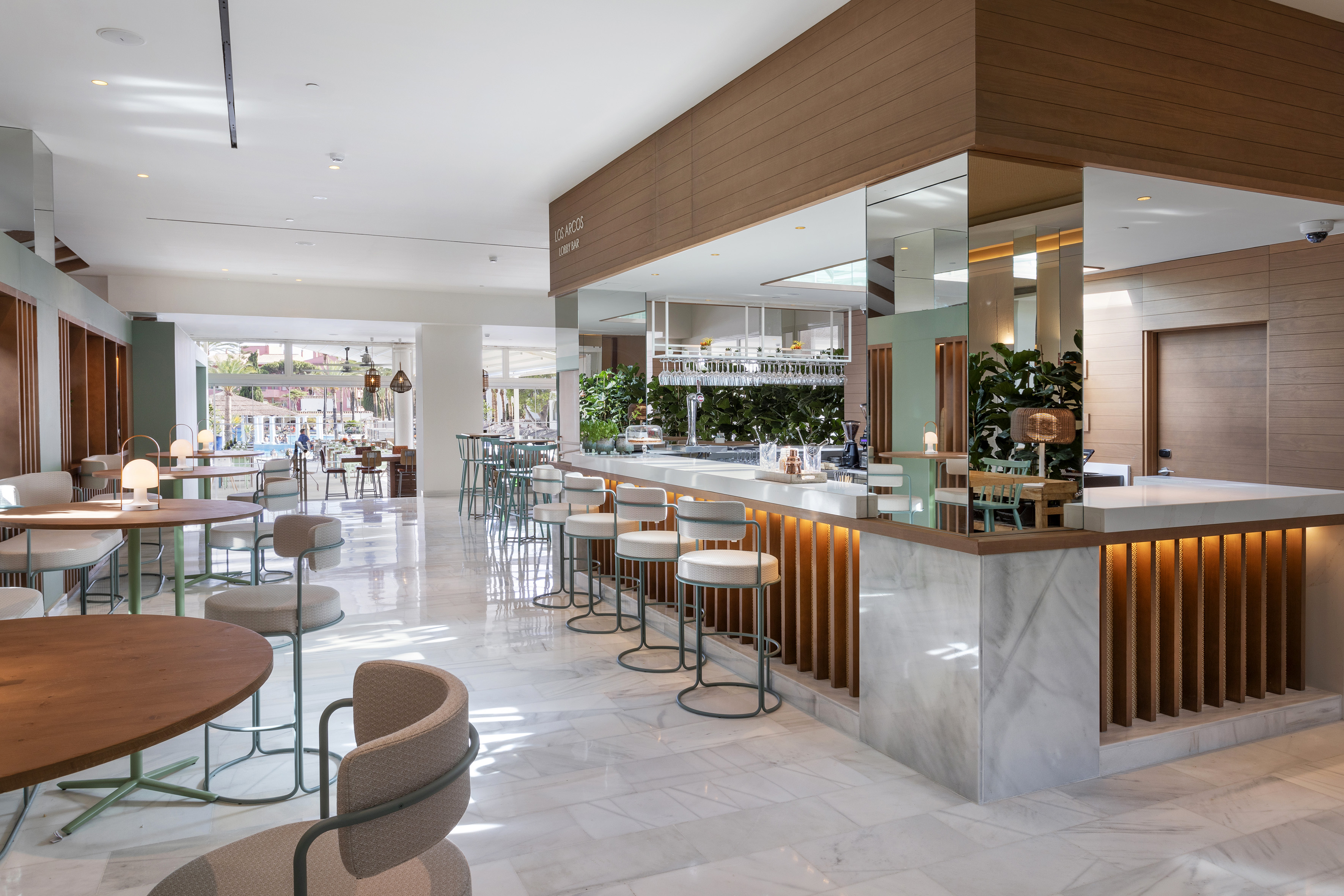 a restaurant with tables and chairs