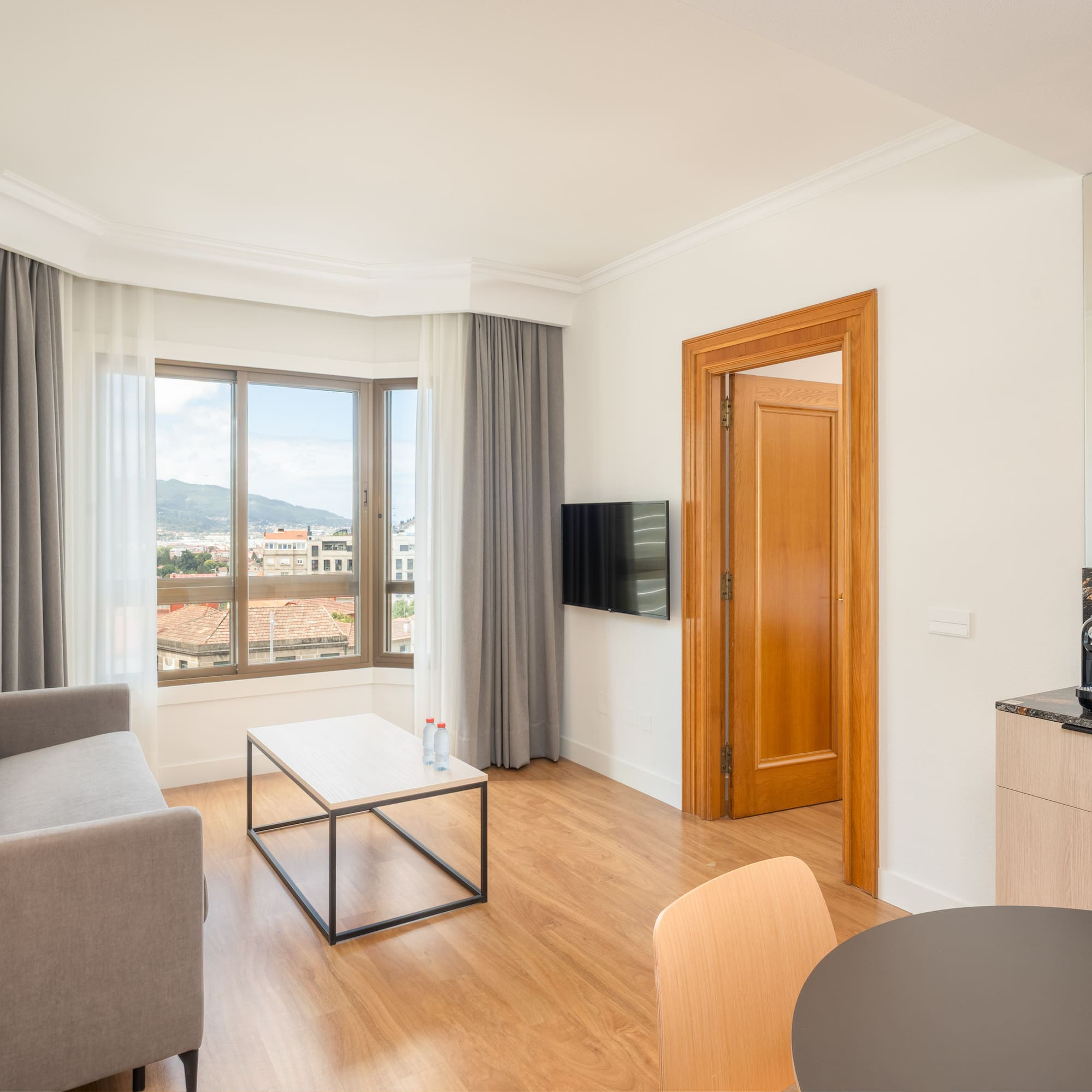 a living room with a couch and a table