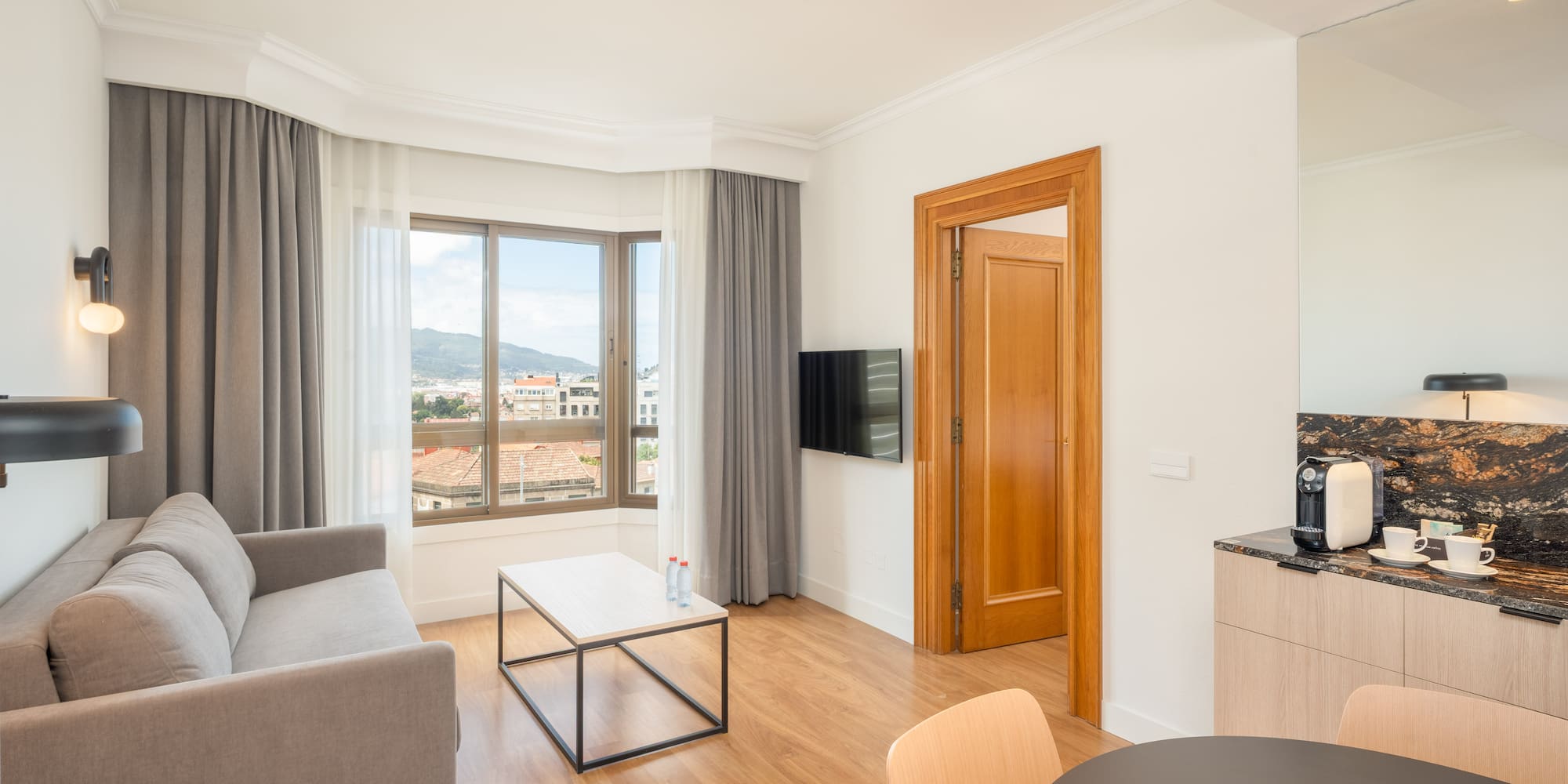 a living room with a couch and a table