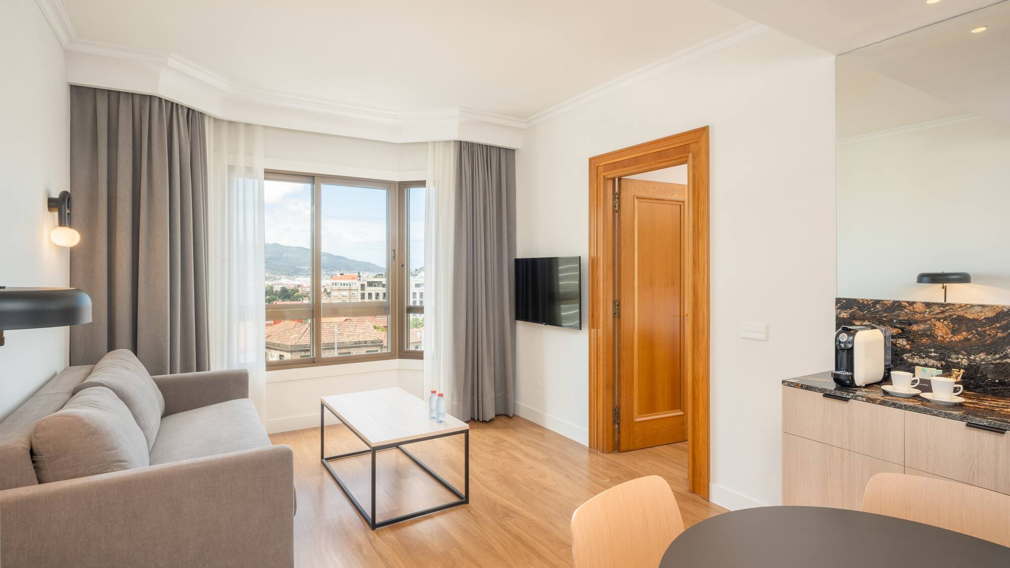 a living room with a couch and a table
