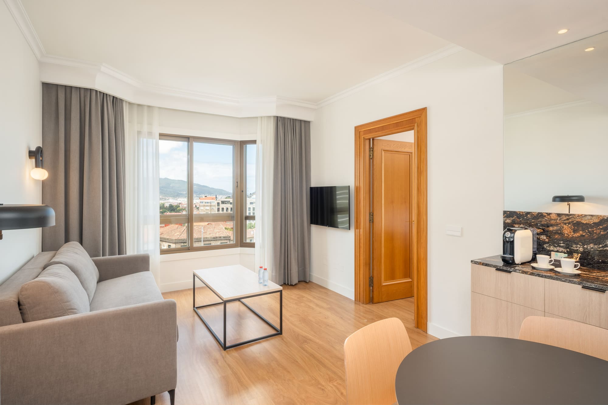 a living room with a couch and a table