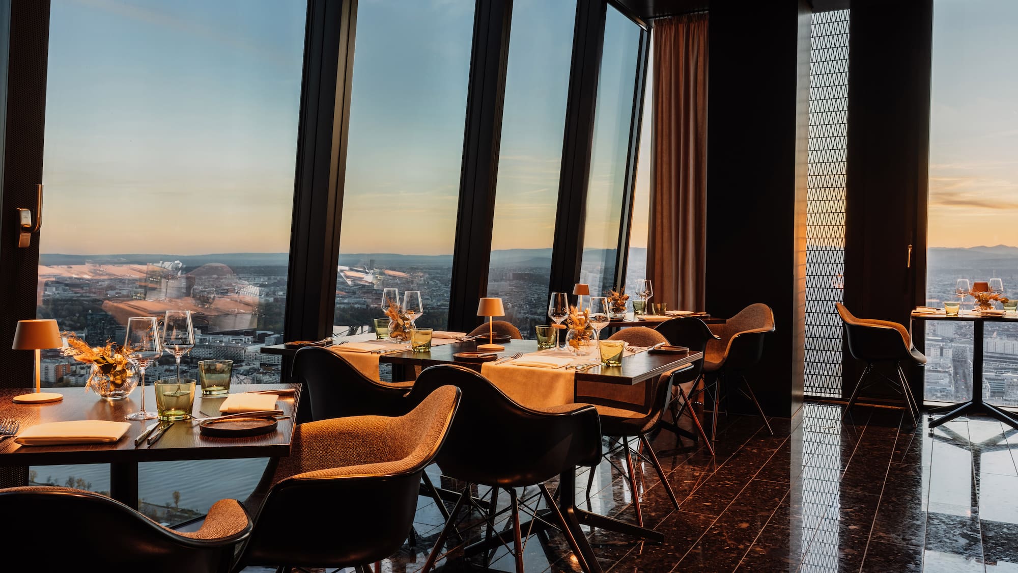 a restaurant with a view of the city