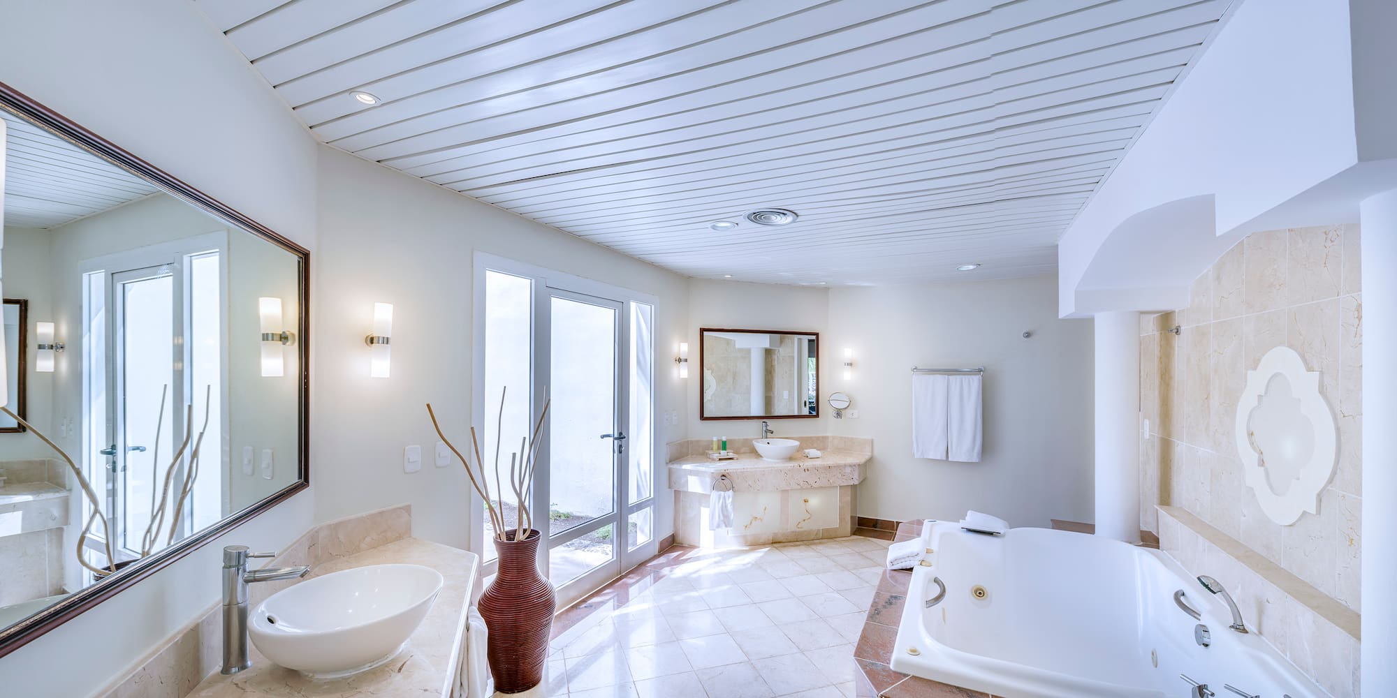 a bathroom with a tub and sink