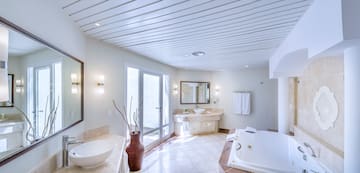 a bathroom with a tub and sink