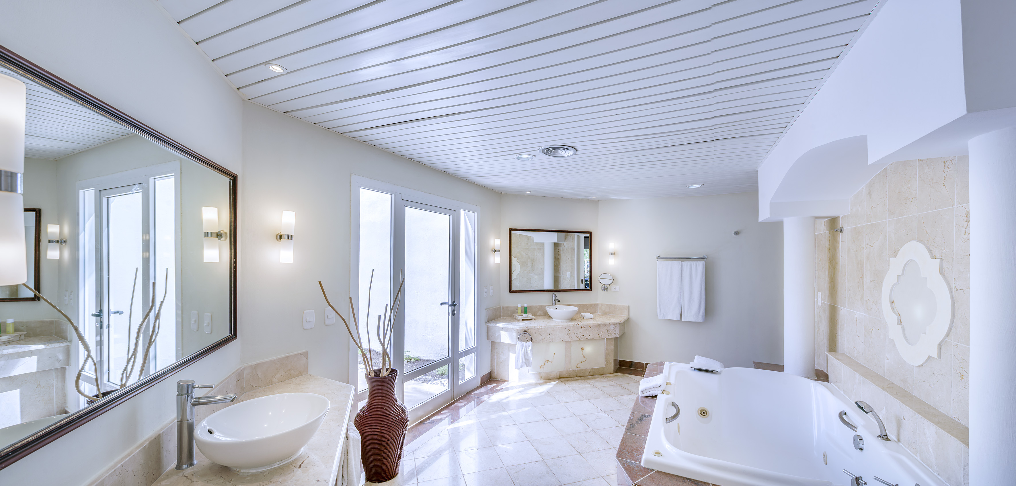 a bathroom with a tub and sink