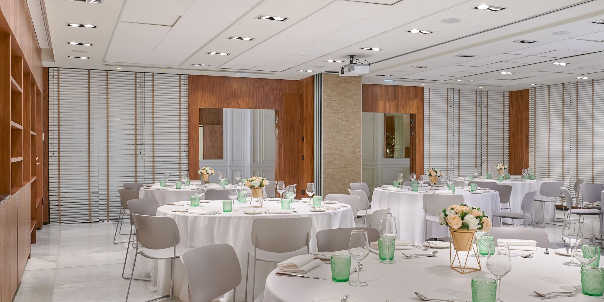 a room with tables and chairs