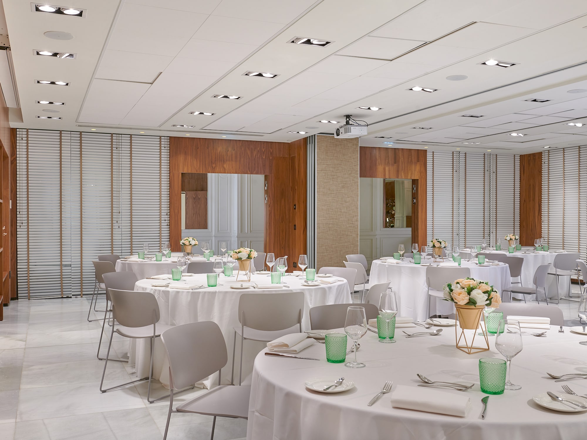 a room with tables and chairs