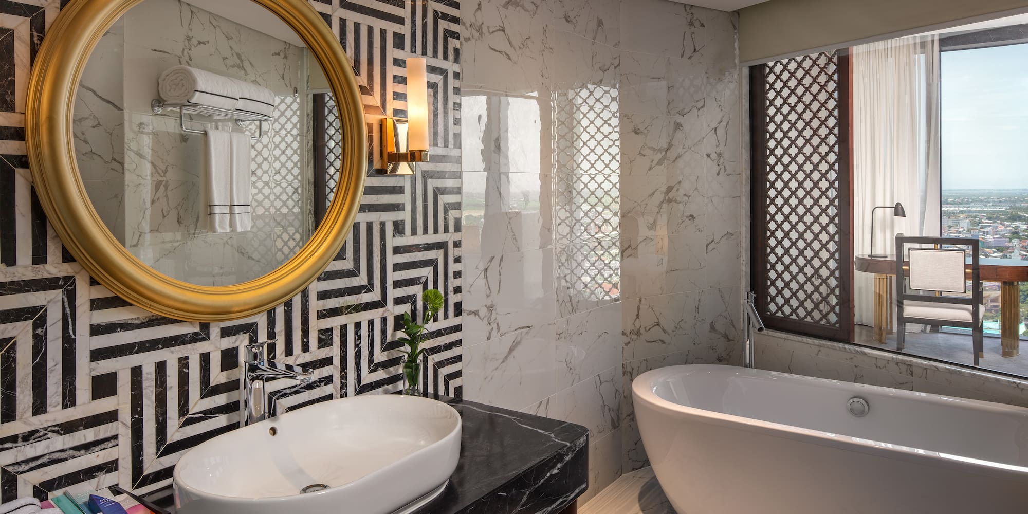 a bathroom with a tub and a sink