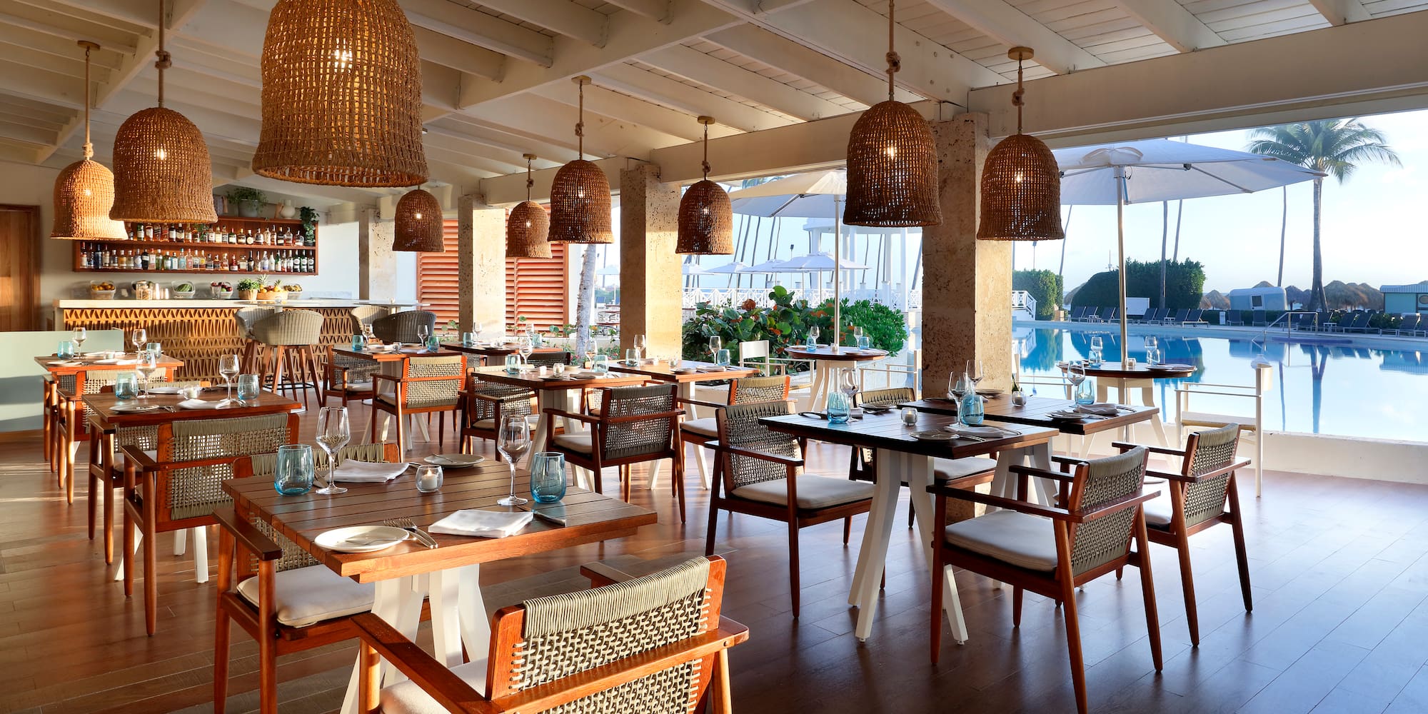 a restaurant with tables and chairs