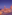 Valletta, Malta cityscape at dusk, dome, spire, historic buildings by the sea.
