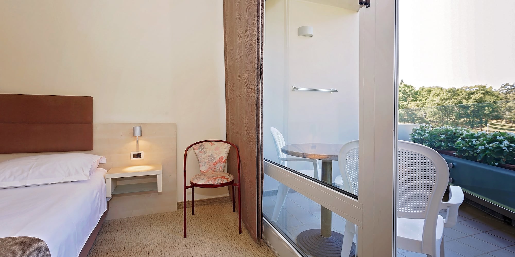 a room with a bed and a table