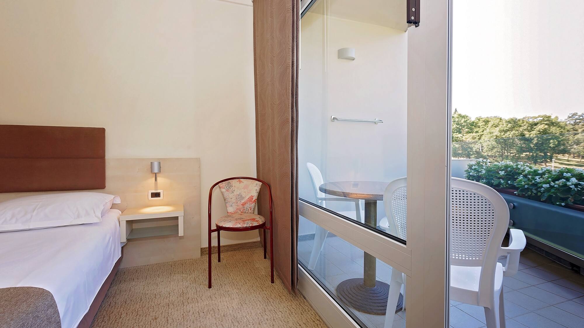 a room with a bed and a table