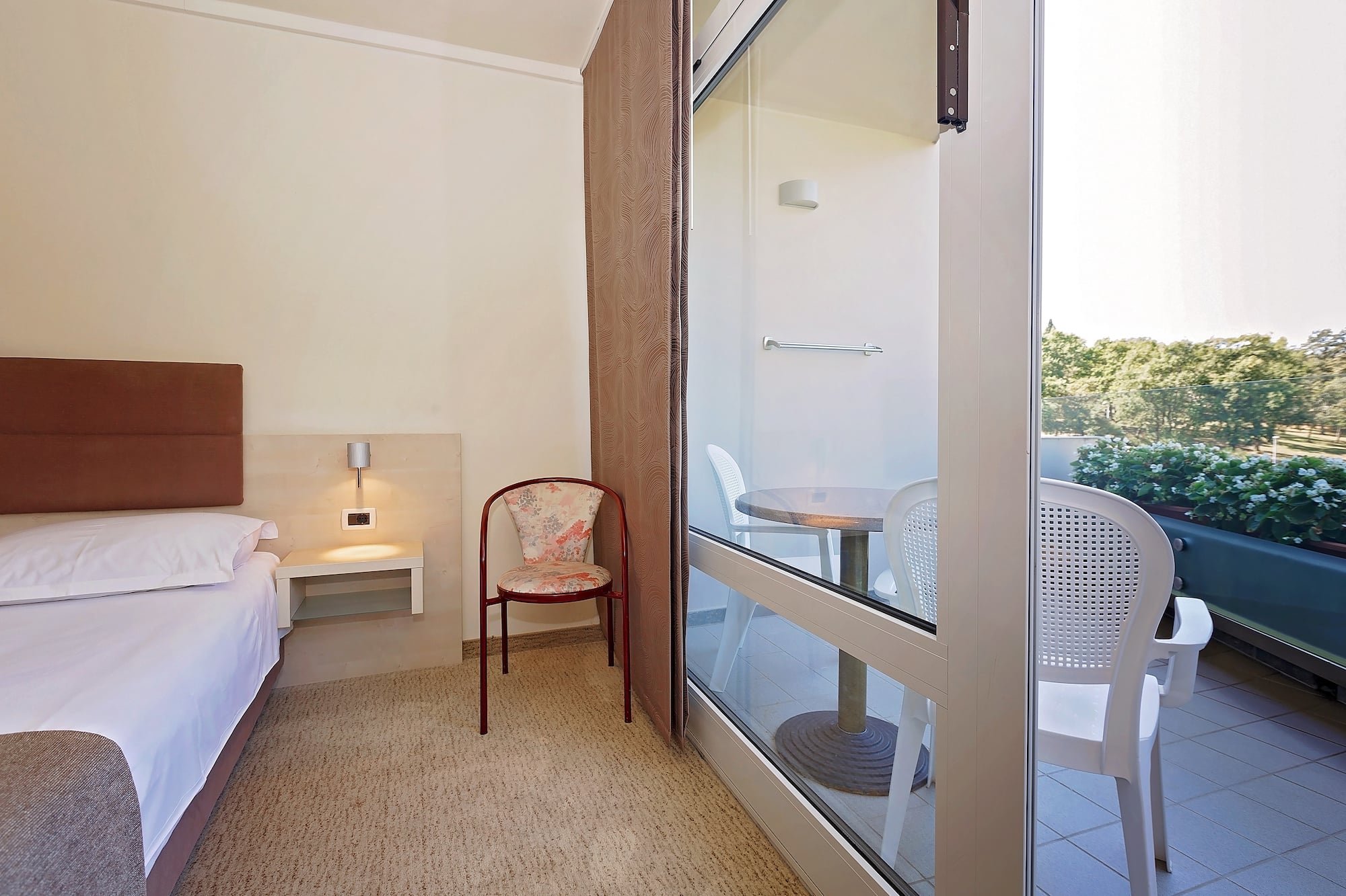 a room with a bed and a table