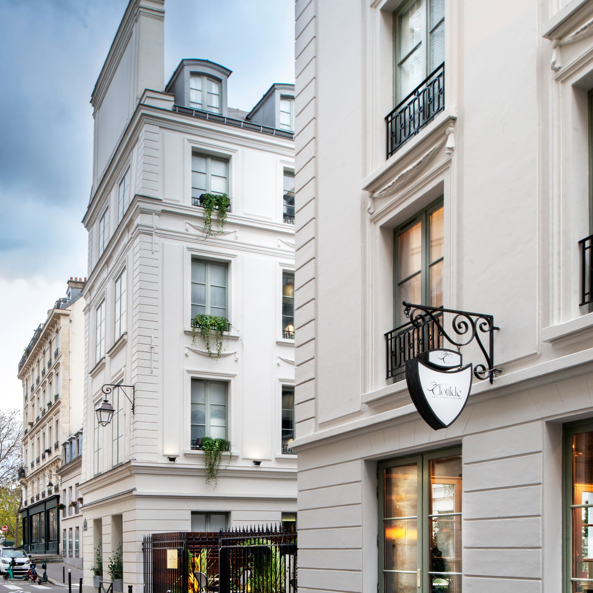 a white building with a sign on the side