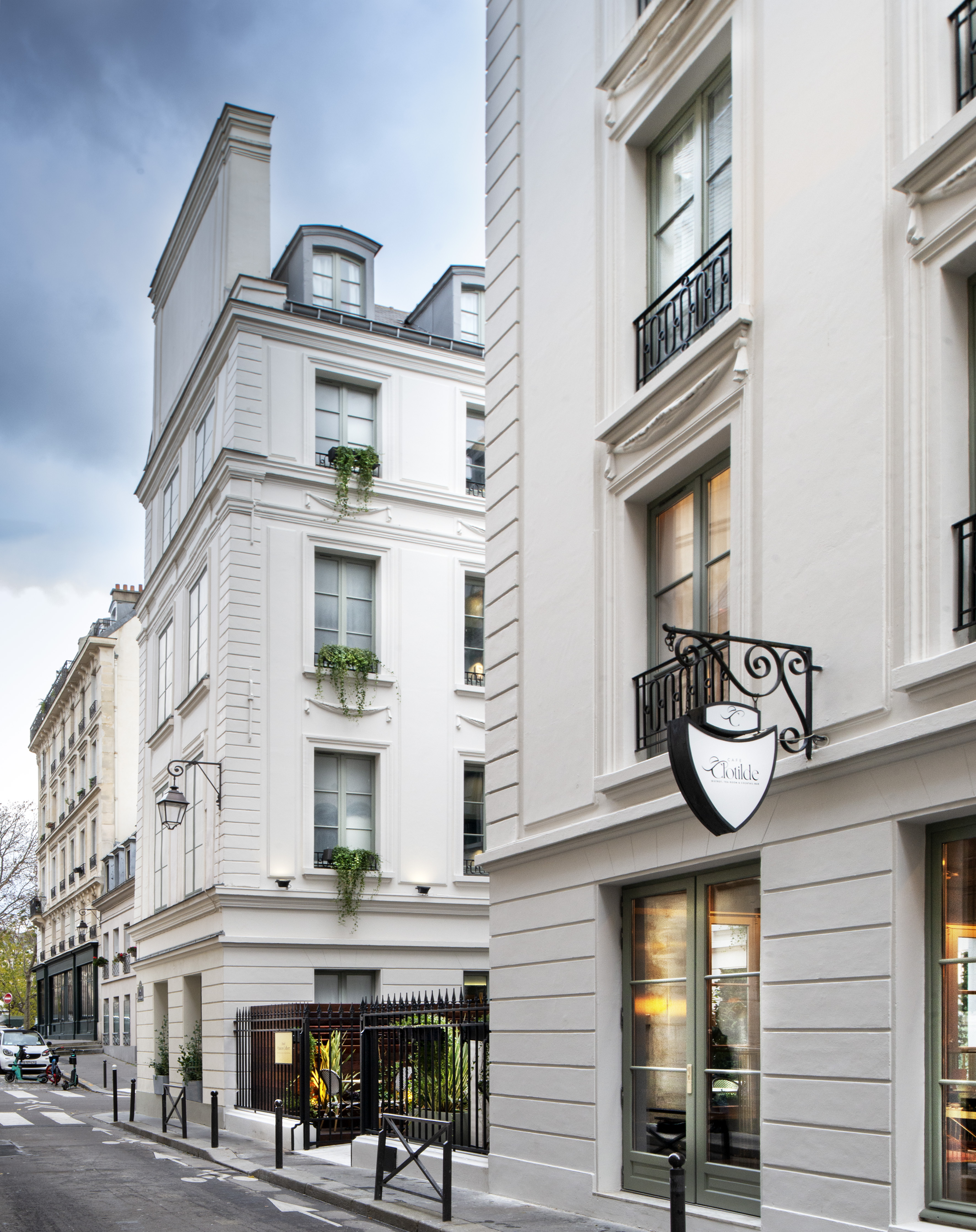 a white building with a sign on the side