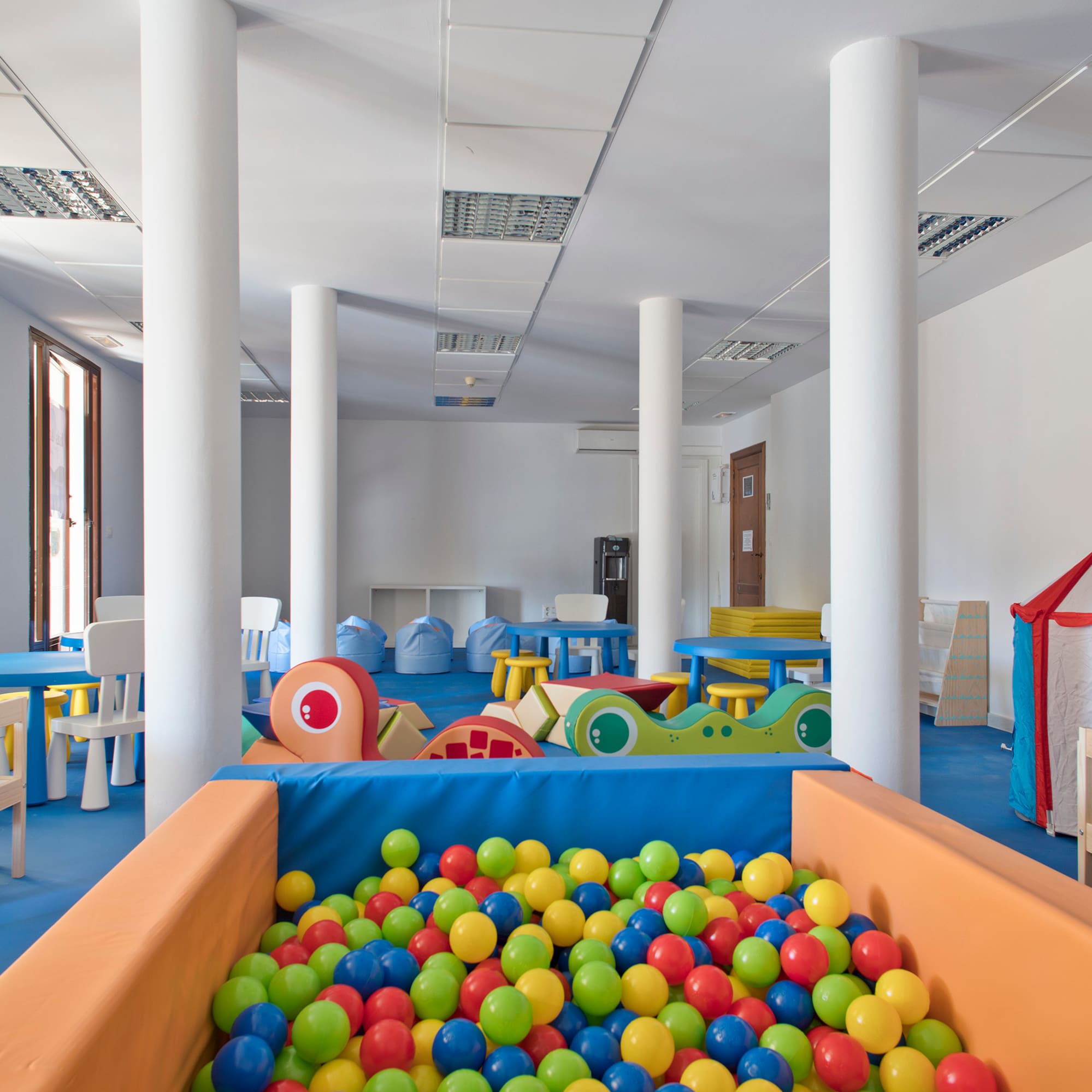a room with a pool of balls
