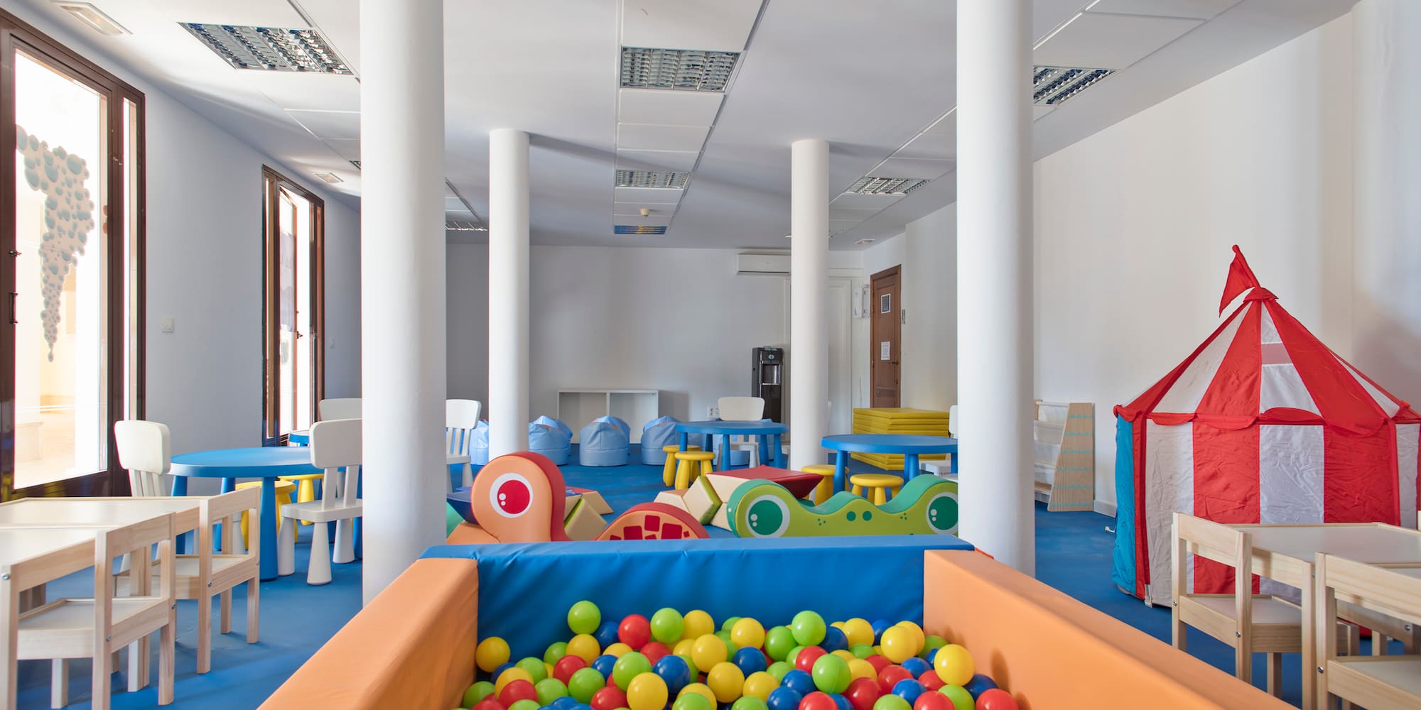 a room with a pool of balls