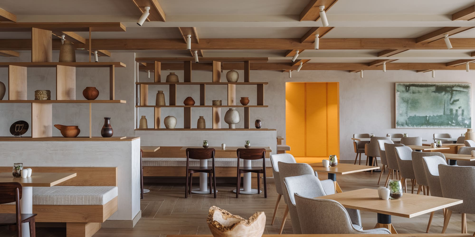 a room with tables and chairs