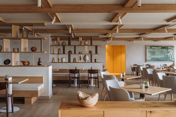 a room with tables and chairs