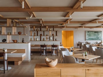 a room with tables and chairs