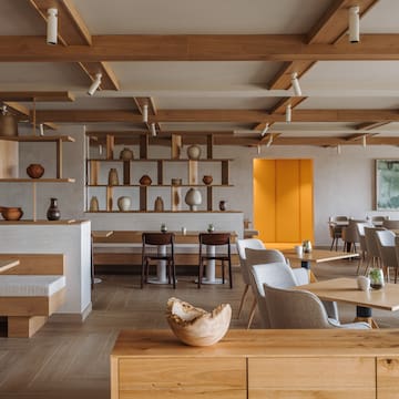 a room with tables and chairs