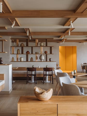 a room with tables and chairs