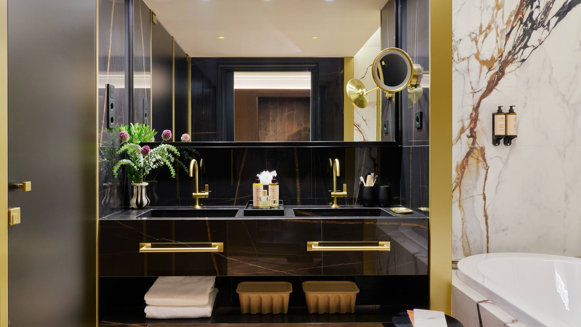 a bathroom with a sink and mirror