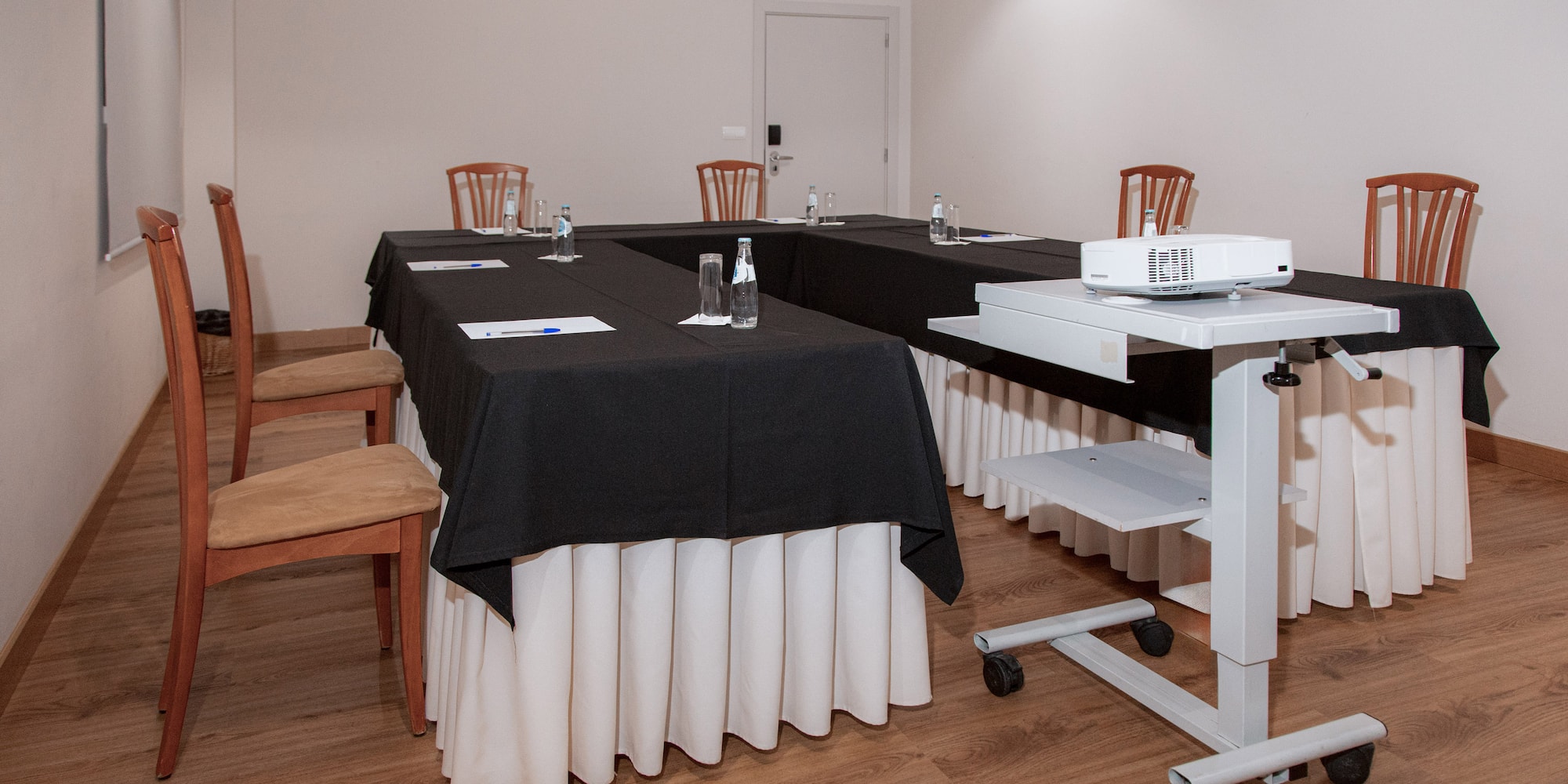 a room with tables and chairs