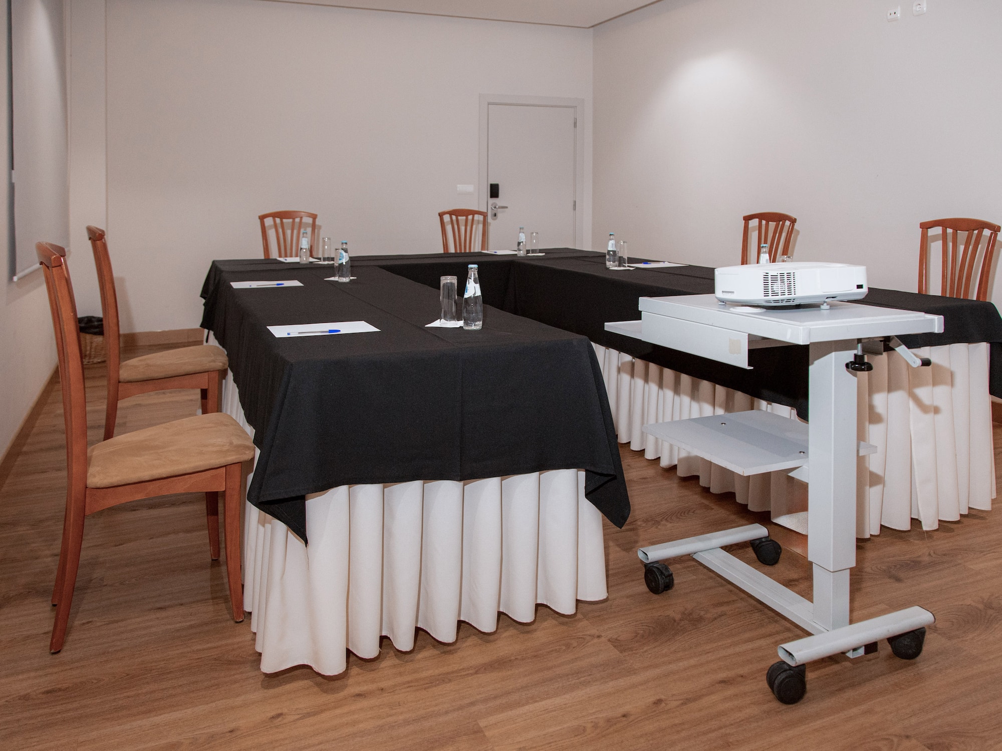 a room with tables and chairs