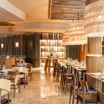 a restaurant with tables and chairs