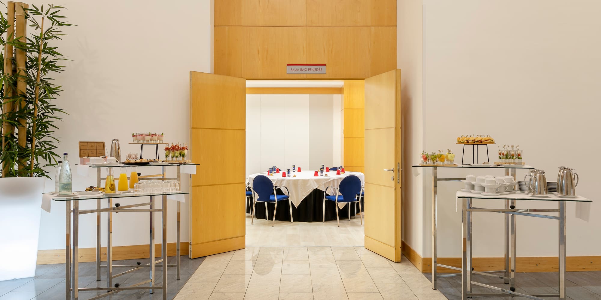 a room with tables and chairs