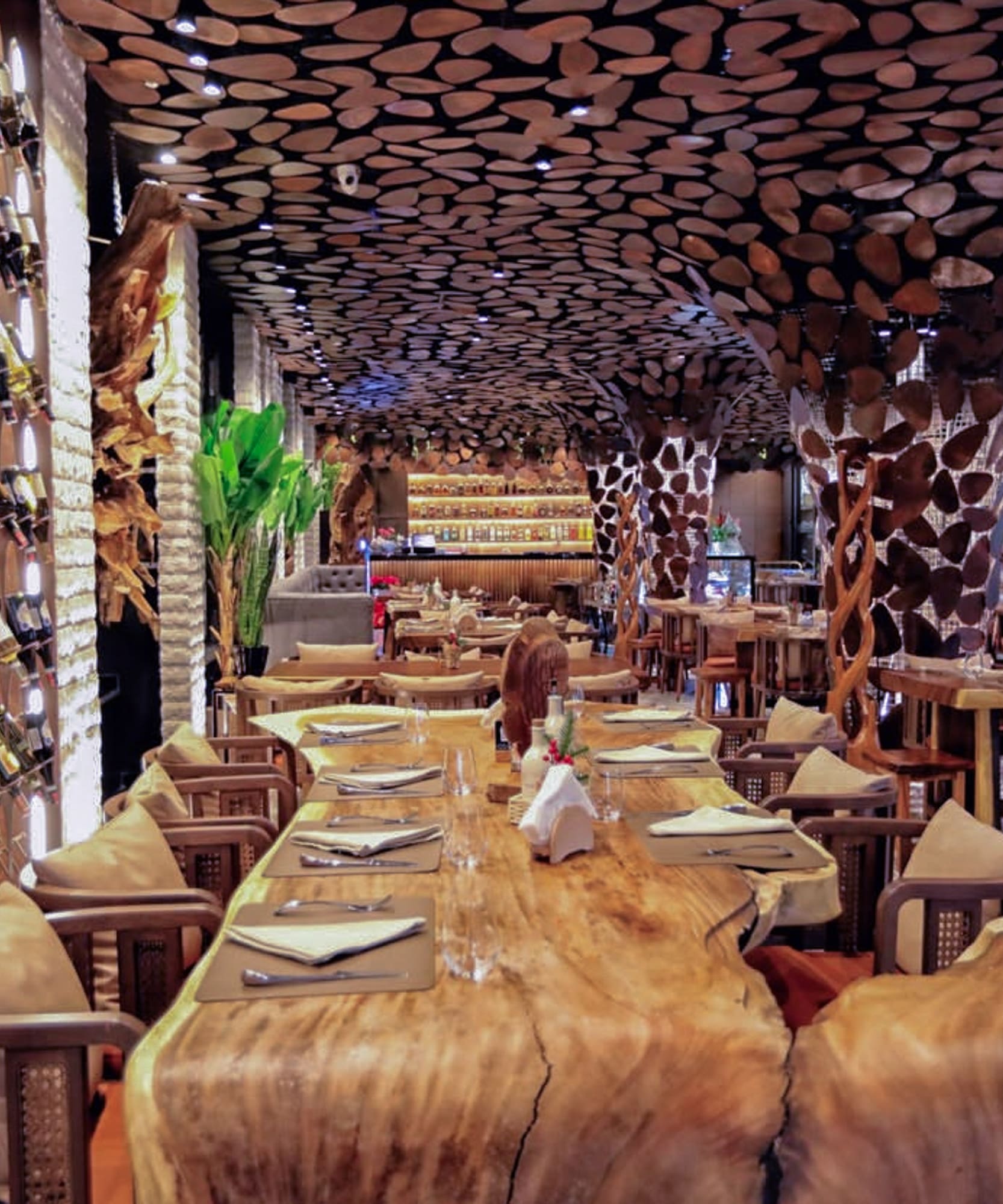 a restaurant with tables and chairs