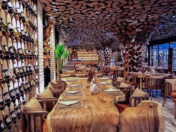 a restaurant with tables and chairs