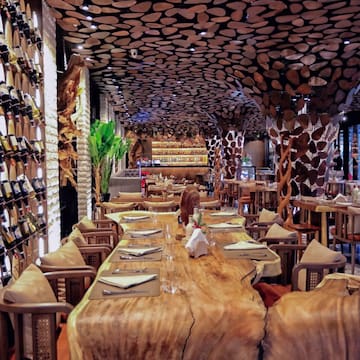 a restaurant with tables and chairs