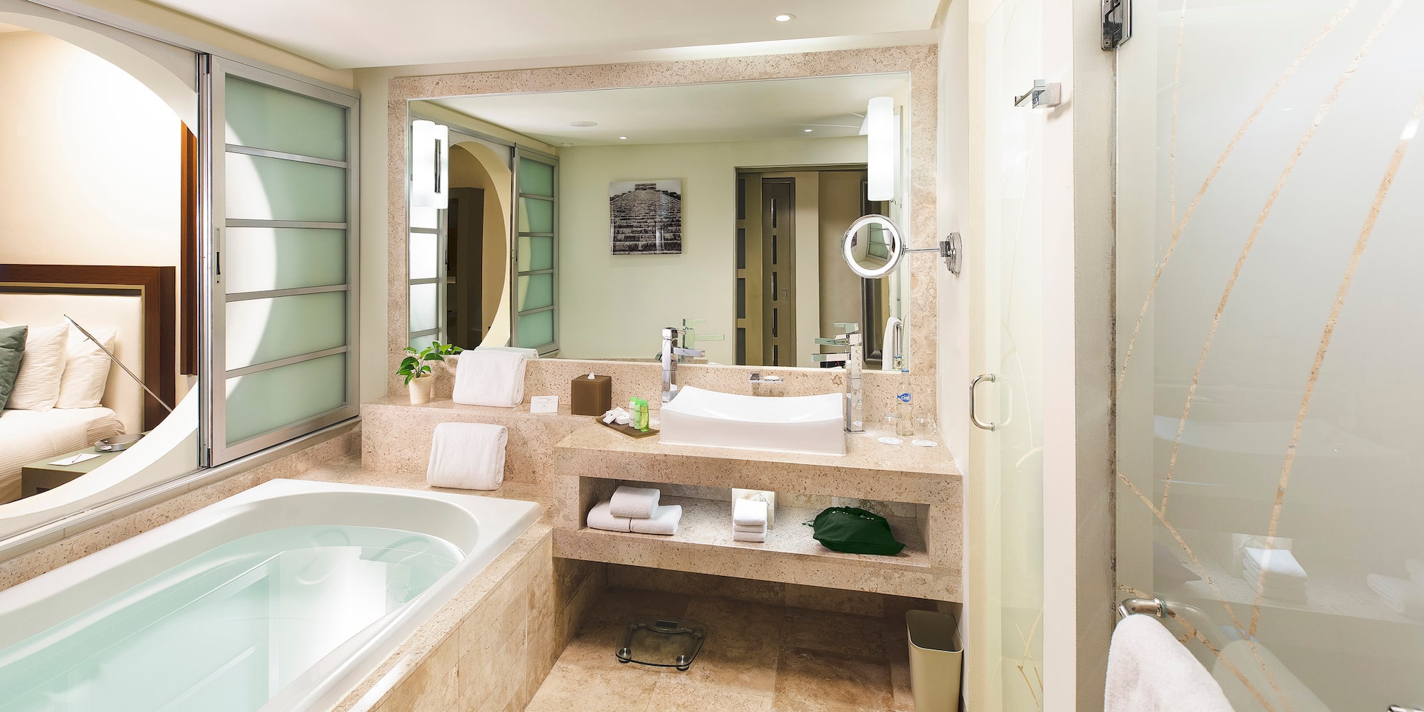 Modern luxury hotel bathroom with large bathtub, vanity, and glass shower. - Family Concierge Junior Suite Nature View - Paradisus Playa del Carmen - Riviera Maya, Playa del Carmen