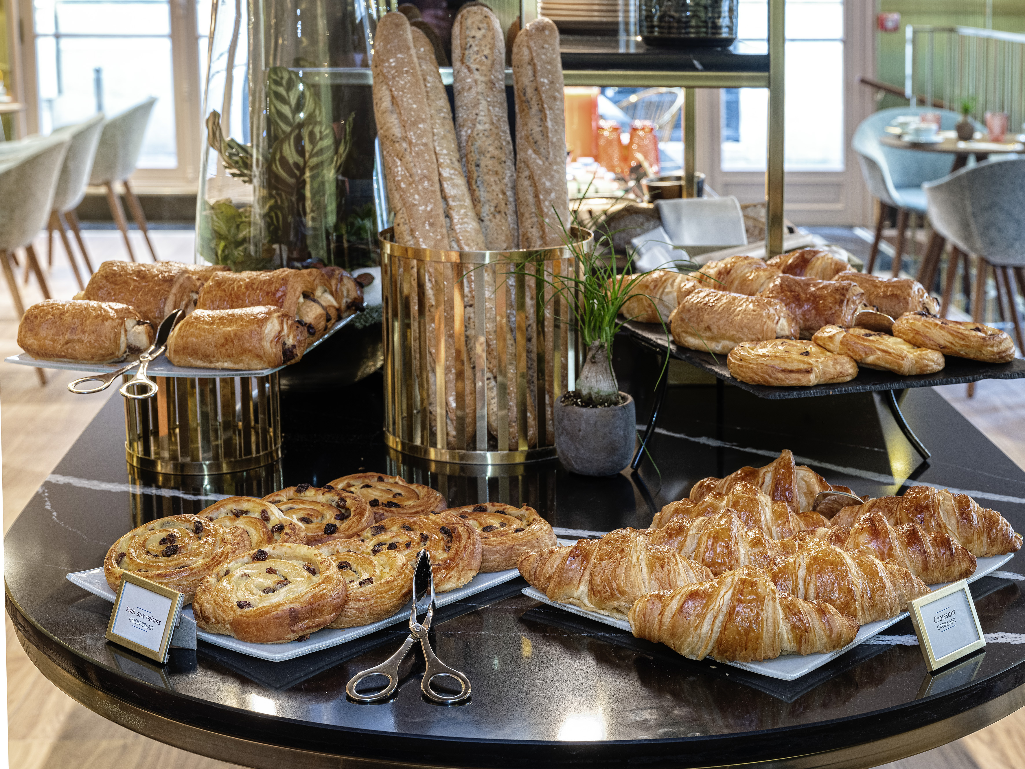 a table with pastries and bread