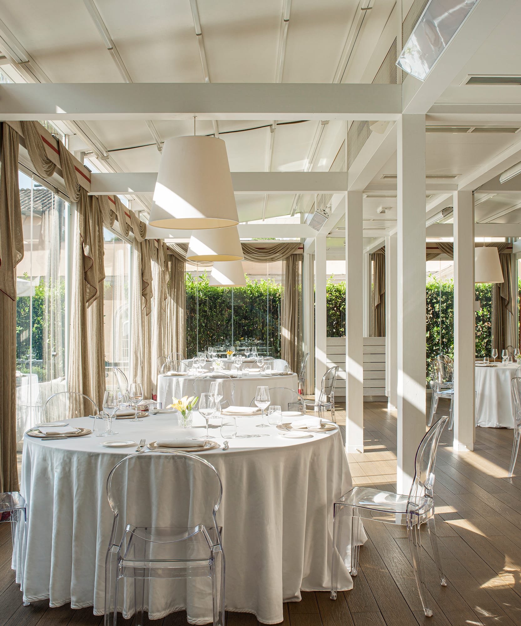 a room with tables and chairs