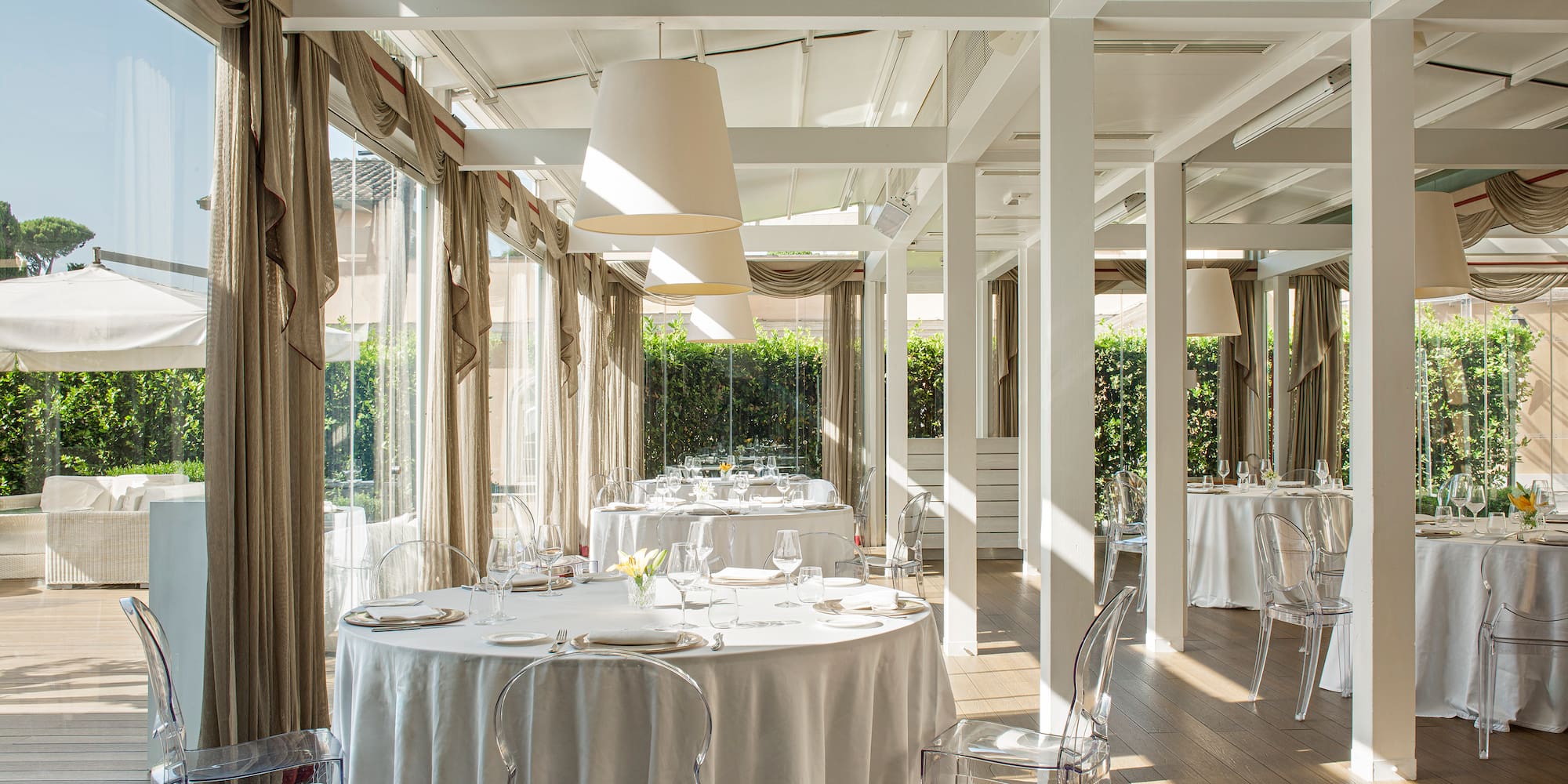 a room with tables and chairs