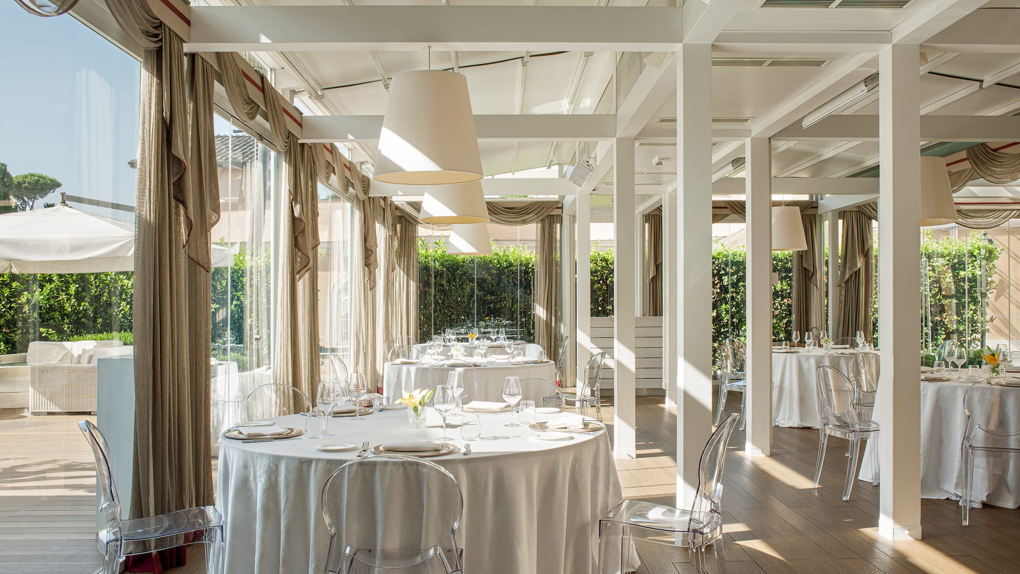 a room with tables and chairs